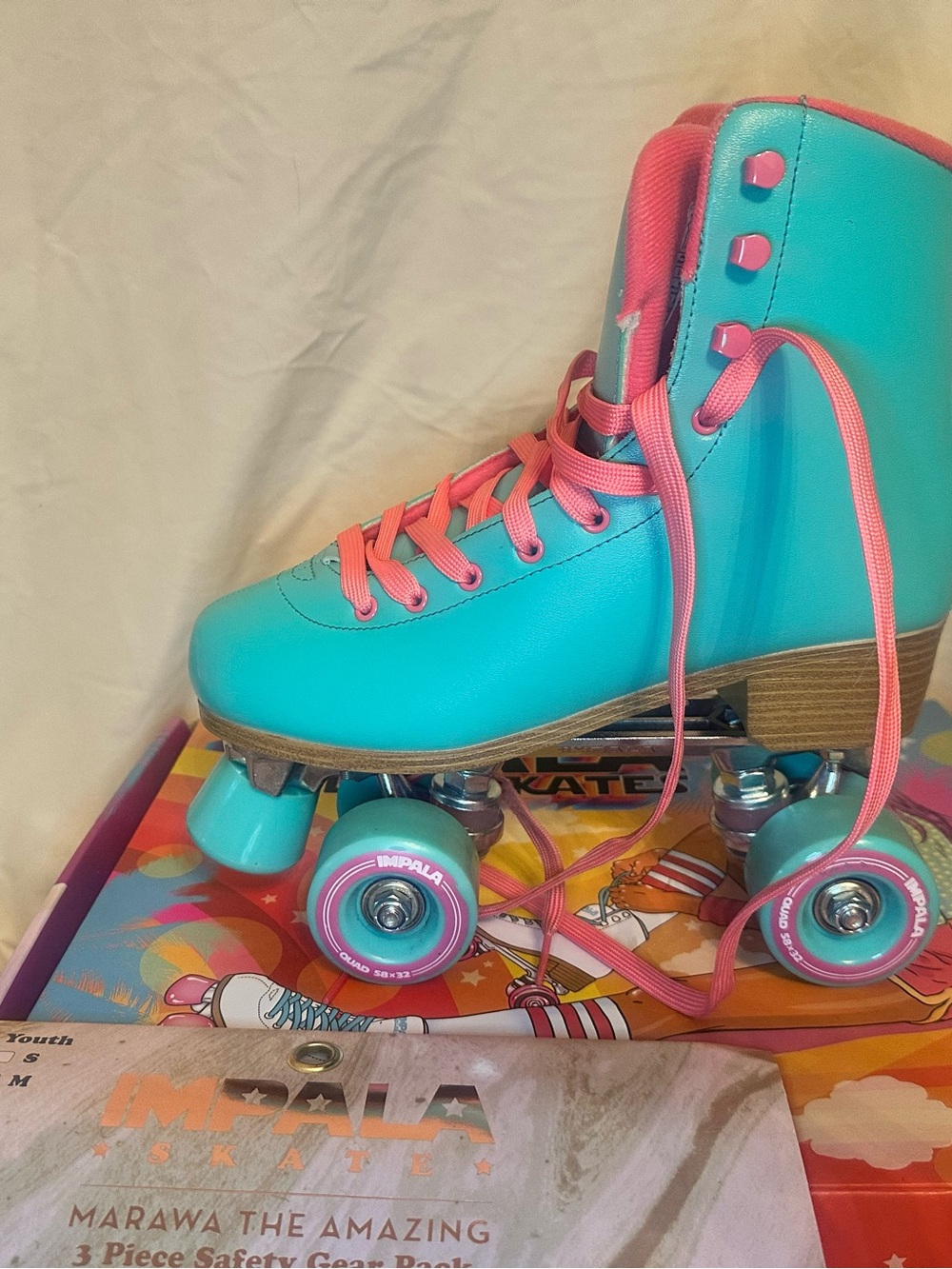 Newish Teal and Pink Retro Roller Skates - Impala Wheel Detail